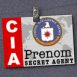 Badge CIA avec bandeau rouge